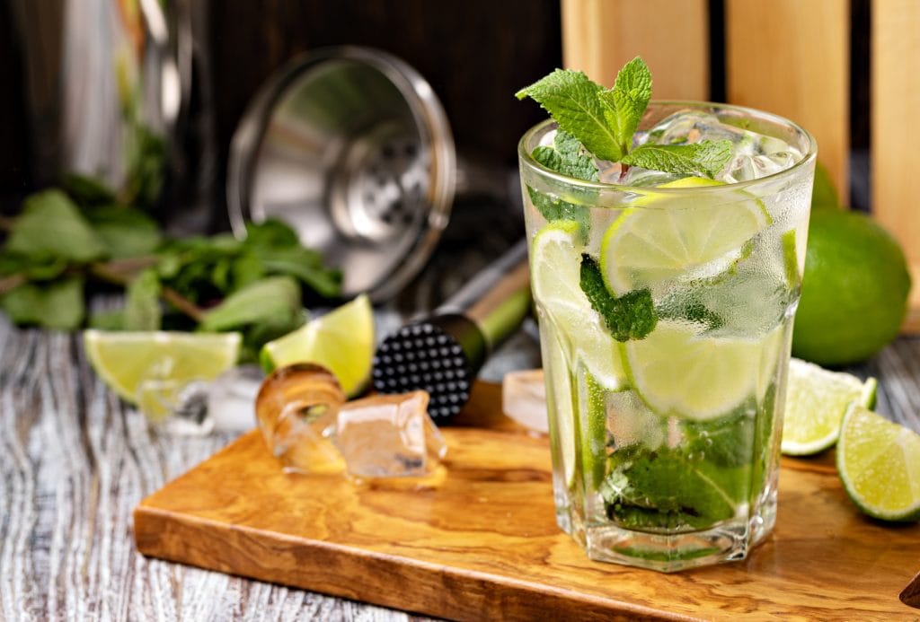 Mojito cocktail with lime, mint and ice